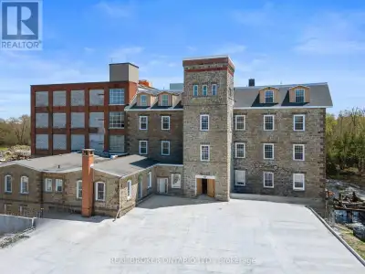 Experience effortless living in the iconic Tri Century Mill Suites in the heart of Carleton Place. T...