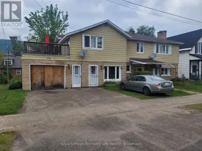 Income producing property! 3-bedroom residence. 2 large separate entrance units. One unit has large...