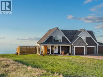 Nestled along the shoreline in the charming coastal community of Cap-Pelé, this exceptional waterfro...