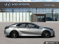 The *2024 Toyota Camry Hybrid SE* combines aggressive sport styling with class-leading fuel efficien... (image 5)