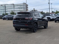 The 2026 Jeep Compass North in Diamond Black Crystal Pearl with a Black interior combines bold style... (image 6)