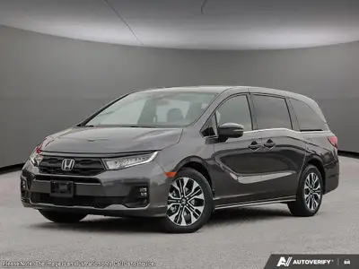 The 2026 Honda Odyssey Touring van in elegant Gray, complemented by a reliable automatic transmissio...