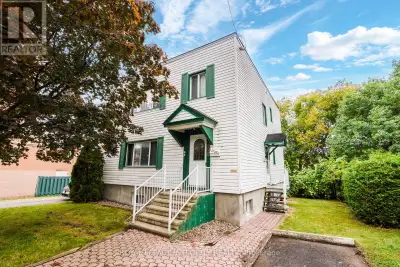 Cashflow and development potential in one clean package! 256 Alfred's double wide lot on R4UA zoning...