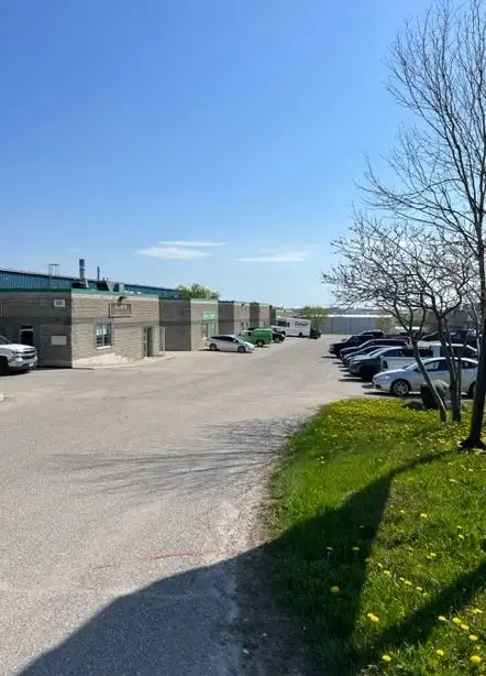 Great Industrial location in South Barrie Just off Hwy 400 14/ Clears Ceilings Dive in Door 2 Office...