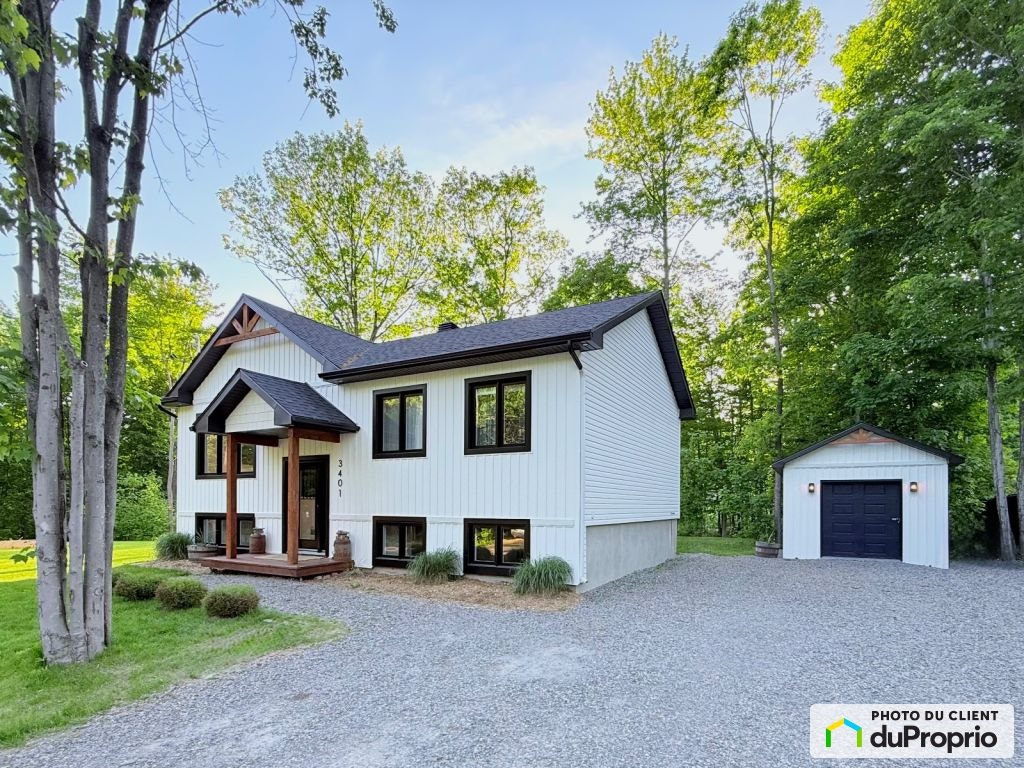 $497,000 - Bungalow for sale in Ste-Julienne — photo 1