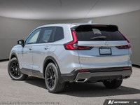 The 2026 Honda CR-V Hybrid EX-L AWD in stunning Silver is a versatile SUV that blends efficiency wit... (image 3)