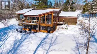 Welcome to this exceptional 3.5-acre four-season waterfront property located directly off Calabogie...