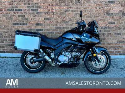 2010 V-Strom 1000 with Aluminum side panniers, SW-Motech engine guards, skid plate, Oxford heated gr...