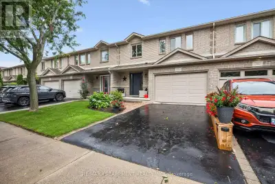 Stunning, extensively renovated & tastefully upgraded FREEHOLD townhome with a 1.5-car garage in sou...