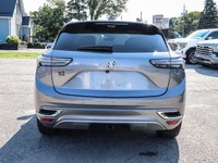 Experience the elegance and sophistication of the 2021 Buick Envision Avenir in a stunning gray exte... (image 3)