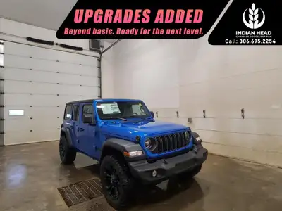 Meet the 2025 Jeep Wrangler Sport S 4x4 in a striking blue finish, equipped with a robust 44 drivetr...