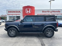 Imagine endless possibilities and the thrill of adventure in this striking 2021 Ford Bronco. Dressed... (image 8)