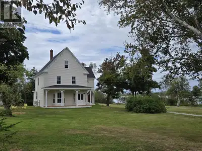 This magnificent historic waterfront property is a rare find! Scenic waterview from the screened por...