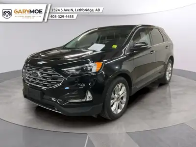 The 2024 Ford Edge Titanium AWD in a sleek black finish promises a dynamic driving experience with i...