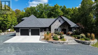 Welcome to this stunning custom-built 4-bedroom, 2.5-bath home nestled on a private, professionally...