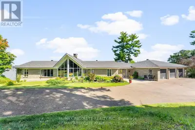 Panoramic views of the Ottawa River from this stunning custom built bungalow!Enjoy waterfront living...