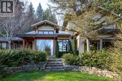 Located in Mansons Landing on Cortes Island, this 2,372 sq ft 3 bed/3 bath, home sits just uphill fr...