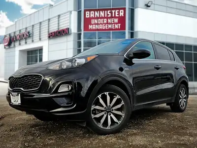 Introducing the sophisticated Black 2020 Kia Sportage LX AWD, a remarkably capable SUV designed to d...