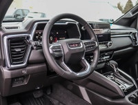 Meet the 2026 GMC Canyon Elevation Crew Cab Short Box 4-Wheel Drive Elevation, a black powerhouse re... (image 7)