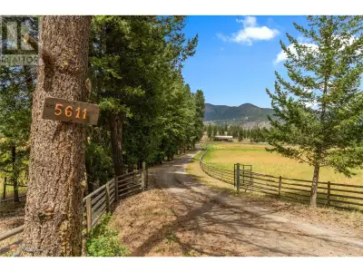 First time on the market since 1989! Tucked away down a long, private, pressure-treated fence-lined...