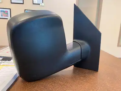 Righthand, manual, dual side mirror with textured housing from a 2013 GMC Savanna 3500. Compatible w...