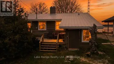 Watch the sun melt into Lake Huron from your very own property! Set along the shores of beautiful La...