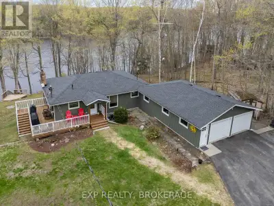 Nestled on a terraced 2/3-acre lot, this meticulously maintained 3-bedroom, 2-bath home combines tho...