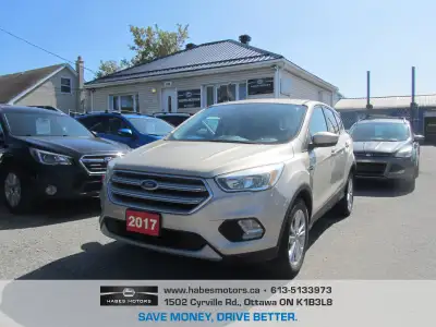 6 MONTHS WARRANTY WITH PURCHASE FOR FREE ! GREAT DEAL ON A GREAT VEHICLE !! 2017 FORD ESCAPE AWD SE...