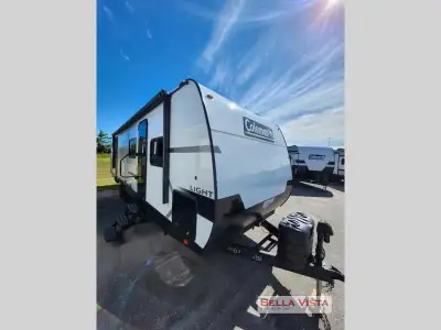 Keystone Coleman Light travel trailer 29BX highlights: Double Slides Outdoor Sink and Refrigerator C...