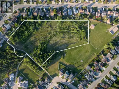 7.04 acres of prime, cleared and leveled residential development land with services to the lot line—...