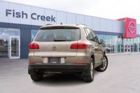 Navigate every road with confidence in this sophisticated 2015 Volkswagen Tiguan Comfortline. Engine... (image 6)
