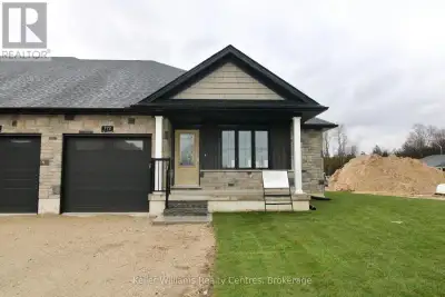 Step into quality and comfort with this beautifully built end unit townhome by Candue Homes, located...