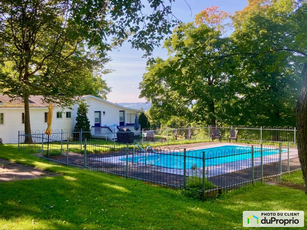 $315,000 - Cottage for sale in Beaumont — photo 1