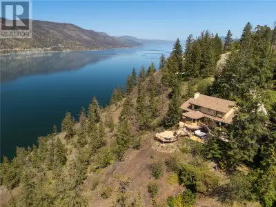 Perfectly positioned to capture sweeping lake and mountain views, this remarkable property was custo...