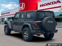 Designed to conquer both rugged trails and urban landscapes, this 2021 Jeep Wrangler Unlimited Rubic... (image 4)