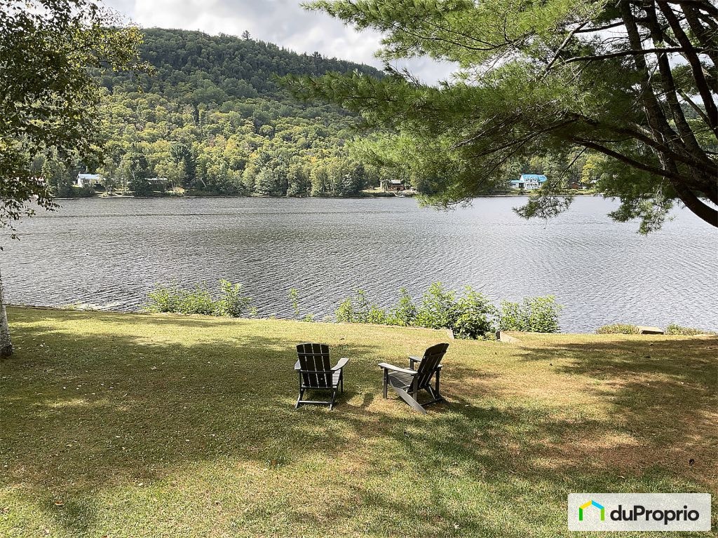 $489,000 - Cottage for sale in Mandeville — photo 2