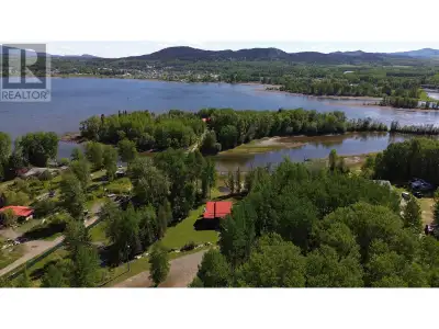 Built in 2001, this custom home sits along a quiet stretch of Stuart Lake with direct water access....