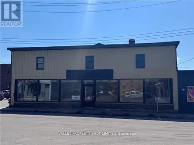 Commercial Opportunity including a 6000 square foot Retail/Warehouse Building. Building was long tim...