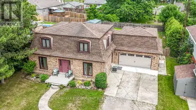 This is not a cookie cutter home! Immaculate two storey home with unique mansard style roof on a qui...