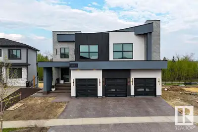This stunning, contemporary estate in prestigious Westpointe of Windermere is a masterpiece by award...