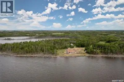 Dream Acreage Alert! This stunning waterfront paradise is tucked into the trees on just over 125 acr...