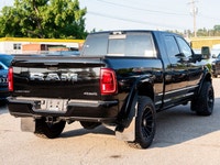 Adds: 2 Inch BDS Lift With NX Shocks & Black Shock Boots 20x10 Hostile Typhoon Wheels 35X12.50R20 Yo... (image 9)