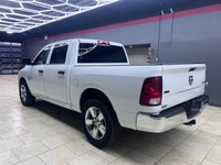 Get ready to own the roads with the stunning 2023 Ram 1500 Classic SLT 4x4 Crew Cab in a pristine wh... (image 4)