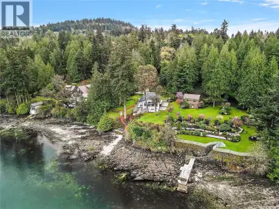 Welcome to your own slice of waterfront paradise! This 1.25 acre property offers breathtaking 180° o...