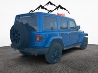THIS WRANGLER SAHARA UNLIMITED COMES WITH THE 2.0L DOHC PHEV ENGINE, PREMIUM MCKINLEY HEATED LEATHER... (image 4)
