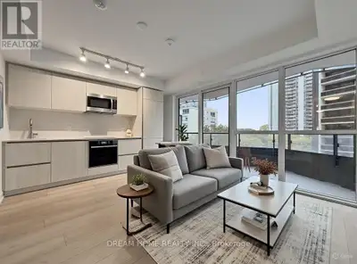 Welcome to this modern and thoughtfully designed 1 bedroom plus den, 1 bathroom residence at 120 Bro...