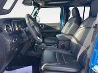 THIS WRANGLER SAHARA UNLIMITED COMES WITH THE 2.0L DOHC PHEV ENGINE, PREMIUM MCKINLEY HEATED LEATHER... (image 8)