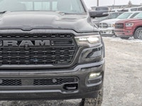 This Ram 1500 has a strong Twin Turbo Premium Unleaded I-6 3.0 L/183 engine powering this Automatic... (image 9)