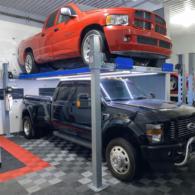 IN STOCK – READY FOR PICKUP OR DELIVERY 11,000LB X-WIDE 4-POST LIFT – BUILT FOR TRUCKS, DUALLYS & MO...