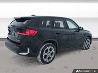This 2023 BMW X1 xDrive28i is powered by a 2.0L turbocharged I4 engine paired with a responsive 7-sp... (image 5)